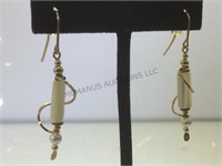 Pair of 14k gold dangle earrings w/ pearls