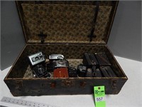 Suitcase full of vintage cameras