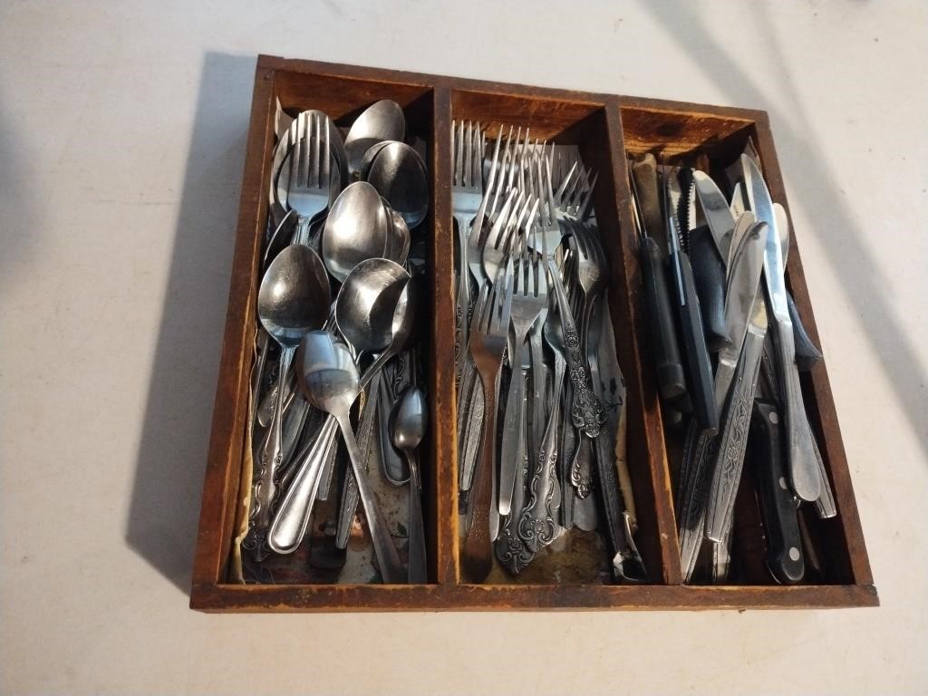 Wood tray with silverware