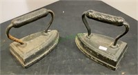 Antique sad irons - lot of two antique solid metal