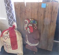 Wood Santa, bag & wood fence