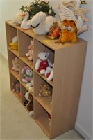 SHELF CONTENTS STUFFED ANIMALS AND FOLDING TABLE