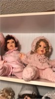 2 pink bonnet dolls