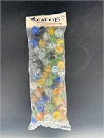 CE BOGARD AND SONS CAIRO WV CAT EYE MARBLES IN BAG