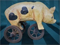 HAND CARVED PIG ON WHEELS