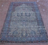 Opulent blue vine area rug.