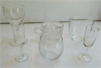 Assorted small glasses and cups
