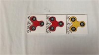 Three fidget spinners