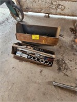 metal toolbox with wrenches, sockets, screw