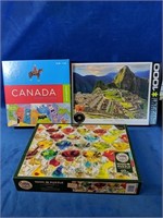 3 Puzzles (2) 1000pc and one 50pc