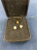 Pair of 14K earrings and a single earring max