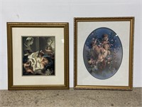 Pair of framed cherub prints