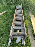 Pile Of Wood Extension Ladders