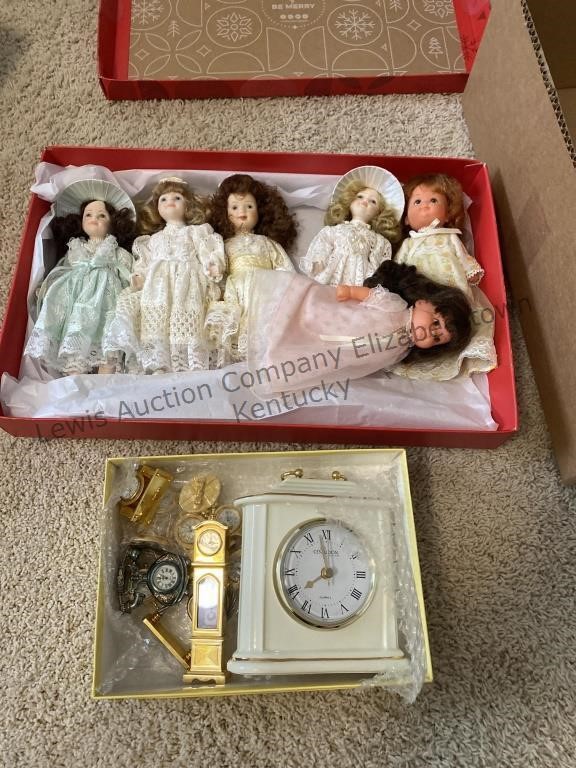 Appears to be vintage dolls, assortment of clocks