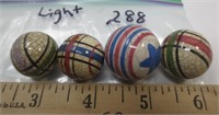 4 marbles, lighter in weight