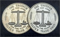 (2) 1 Troy Oz. Silver World Trade Unit Rounds