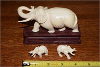 Ivory carved "trunk up" elephant family