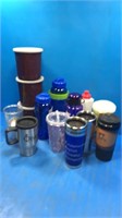 Lot of cups. Thermos