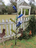 BOTTLE TREE W/ 13 LARGE COLORED GLASS BOTTLES