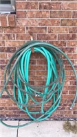 Two hoses and hose holder (you take down)
