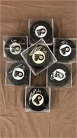 7 Phila Flyers autographed hockey pucks