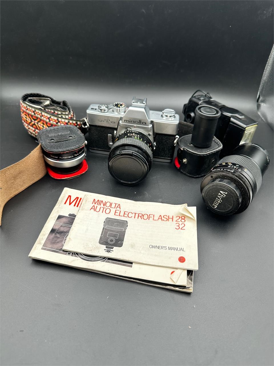 Vintage Minolta Camera with Lenses and Accessories