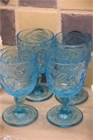 Lot of four blue glasses
