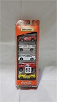 New sealed coke matchbox cars