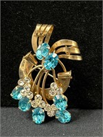 Vtg Blue rhinestone and goldtone pendant brooch