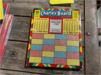 Vintage gambling punchboard Charlie board