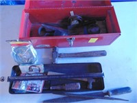 red metal tool box with tools