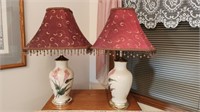 Each table lamp 28 in tall including the finial.