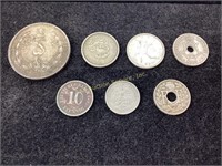 (7) foreign silver coins. 52.8 grams total.