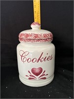cookie jar with red hesrt on it