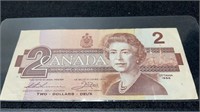 Circulated 1986 Canada 2 Dollar Bill