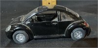 small black volkswagen beetle