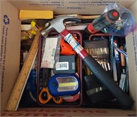box of tools and office supplies