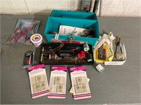 Tool box with pliers, sewing supplies