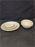 4 cream colored Corelle bowls, 3 plates