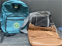 U of S backpack and two other handbags.
