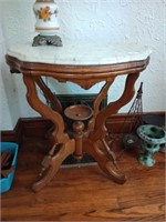 Victorian marble top walnut parlor table. Lamp
