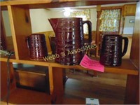 Brown pitcher and 2 brown mugs