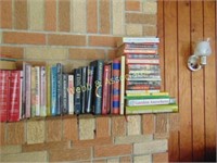 Shelf of books including Readers Digest,