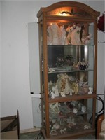 6ft Plus lighted Curio cabinet w/ misc collectibls