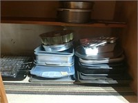 Large group of baking sheets and pans