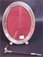 A 10" oval sterling silver picture frame