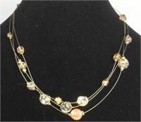 GOLD TONE WIRE BEADED WITH CRYSTAL AND METAL DISCS