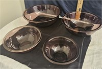 set of 4 pyrex amethyst glass bowls