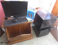 2 drawer file cabinet, monitor, wood cabinet