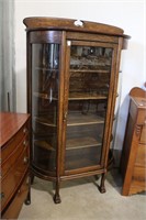 ANTIQUE CLAWFOOT BOW FRONT CABINET